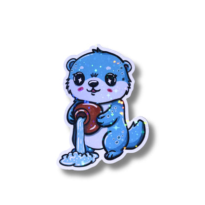 Großer Sternzeichen Sticker Wassermann als hellblauer Otter Fiete aus der Zodiac Cuties Kollektion von Millicat Design vor weißem Hintergrund.